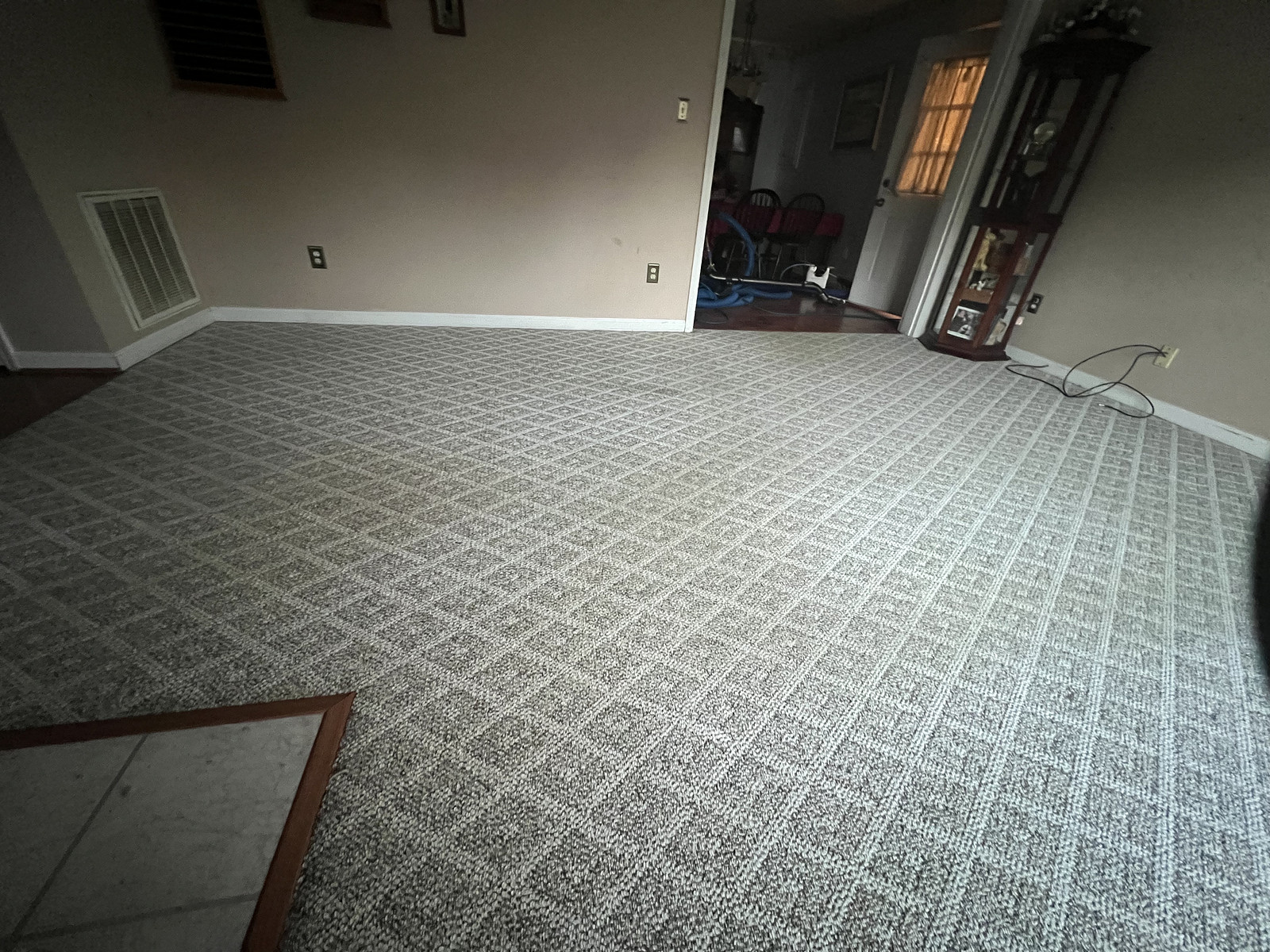 Busy family room in Christiansburg, VA, with a clean carpet thanks to Quest Floor Care