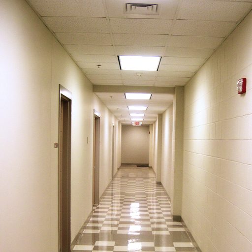 The VCT flooring in this service hallway has recently been polished. The shiny finish on the black and white checkered tiles can be duplicated by Quest Floor Care at businesses throughout Roanoke, Blacksburg, Christiansburg, Radford, Salem, and Pulaski, VA